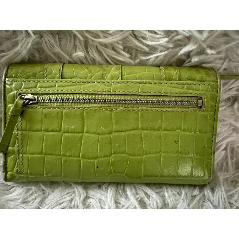 Michael Kors “Natasha” croc embossed leather wallet.